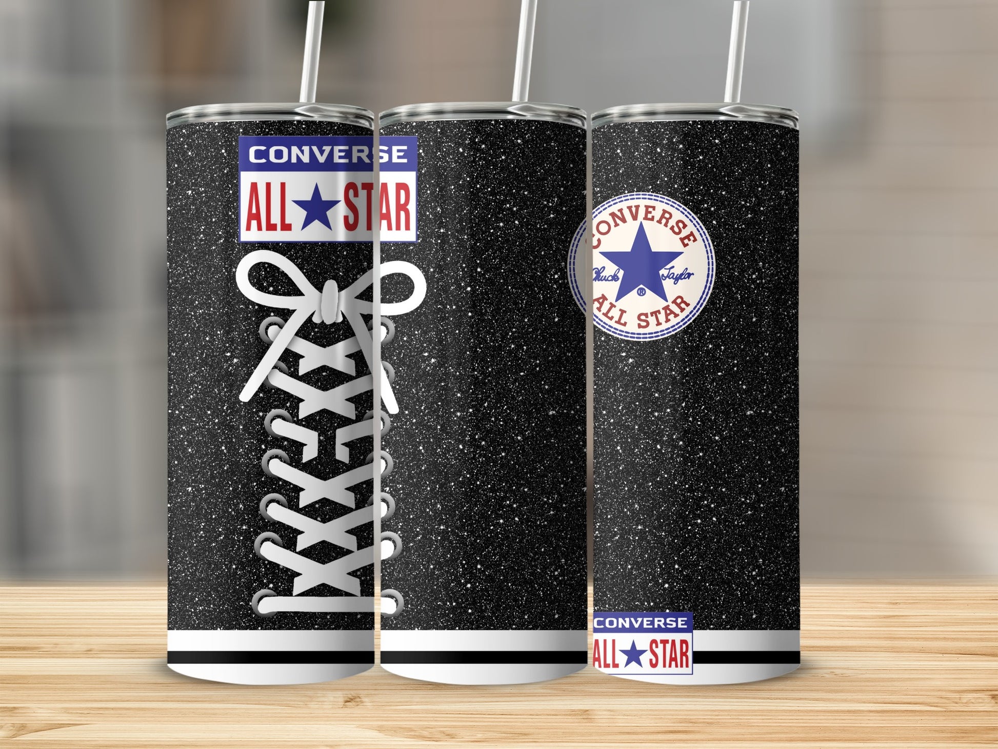 Three glittery Converse All Star tumblers with laces and stars design.