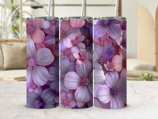 Three purple and pink floral tumblers with reusable straws.