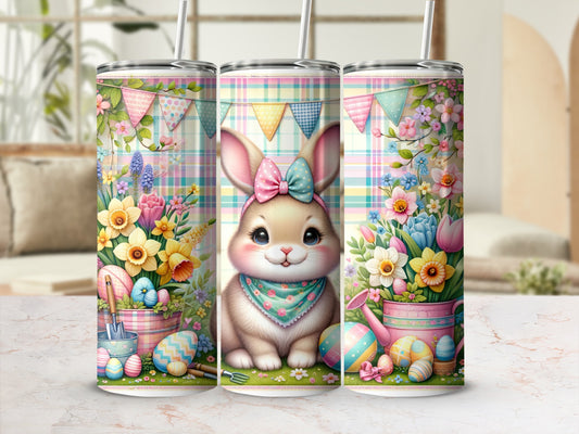 Easter bunny with colorful eggs and flowers on a plaid background.