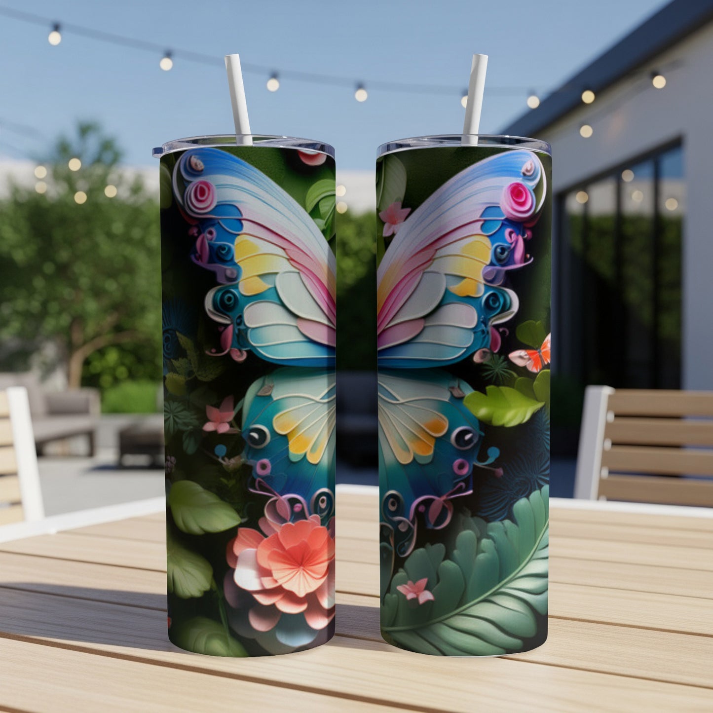 Two tumblers with colorful butterfly wings and floral designs.