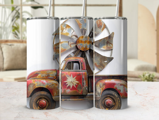 Rusty vintage truck with windmill backdrop on a tumbler.