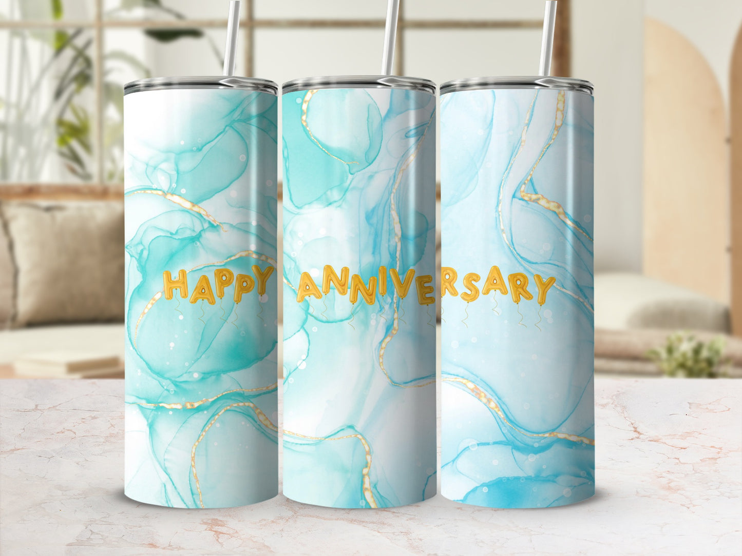 Three tumblers with a marbled blue and gold "Happy Anniversary" design.