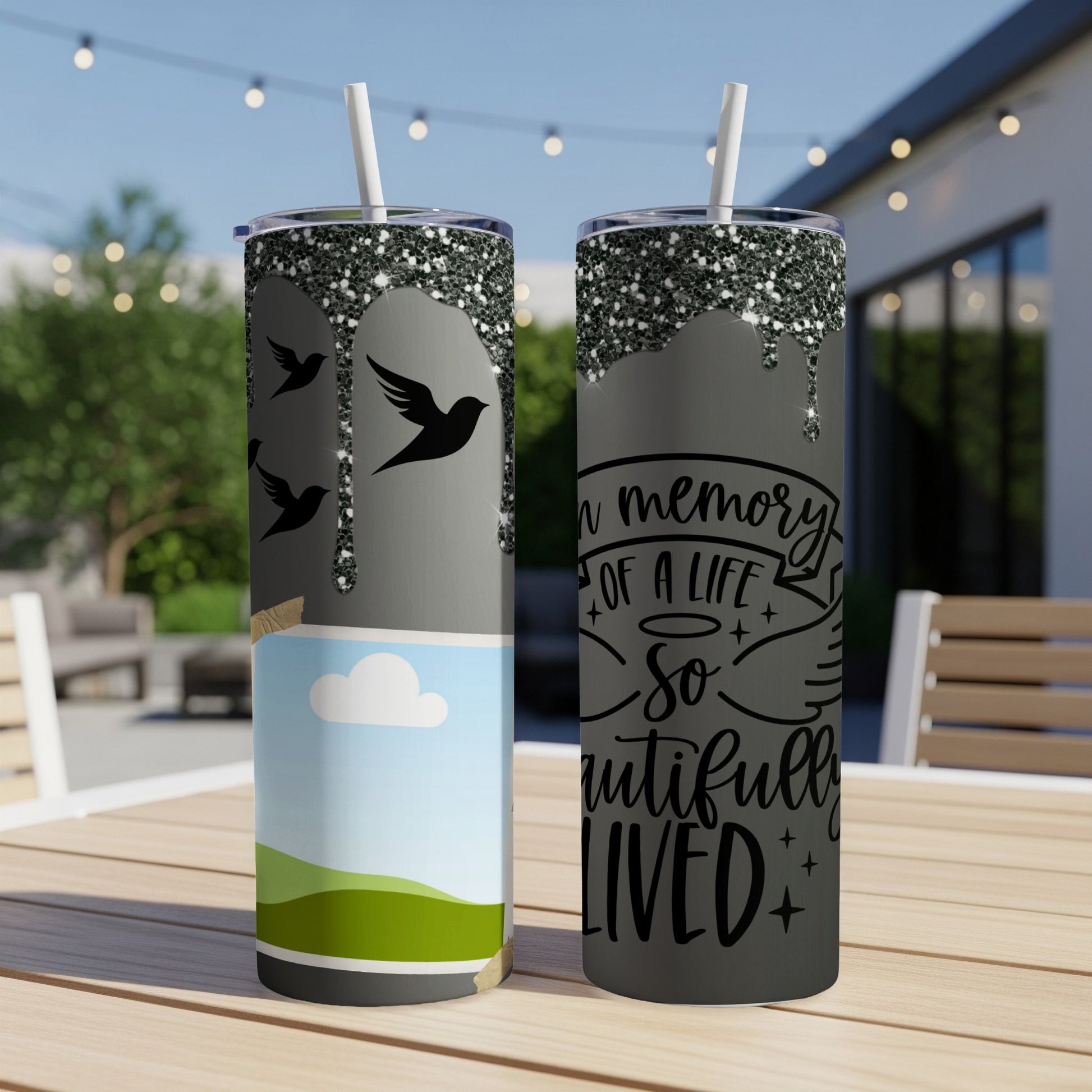 Two tumblers with memorial designs, one with birds, the other text: "In memory of a life so beautifully lived."