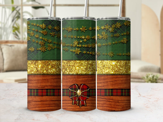 Green plaid tumbler with gold glitter, snowflakes, and plaid bow.