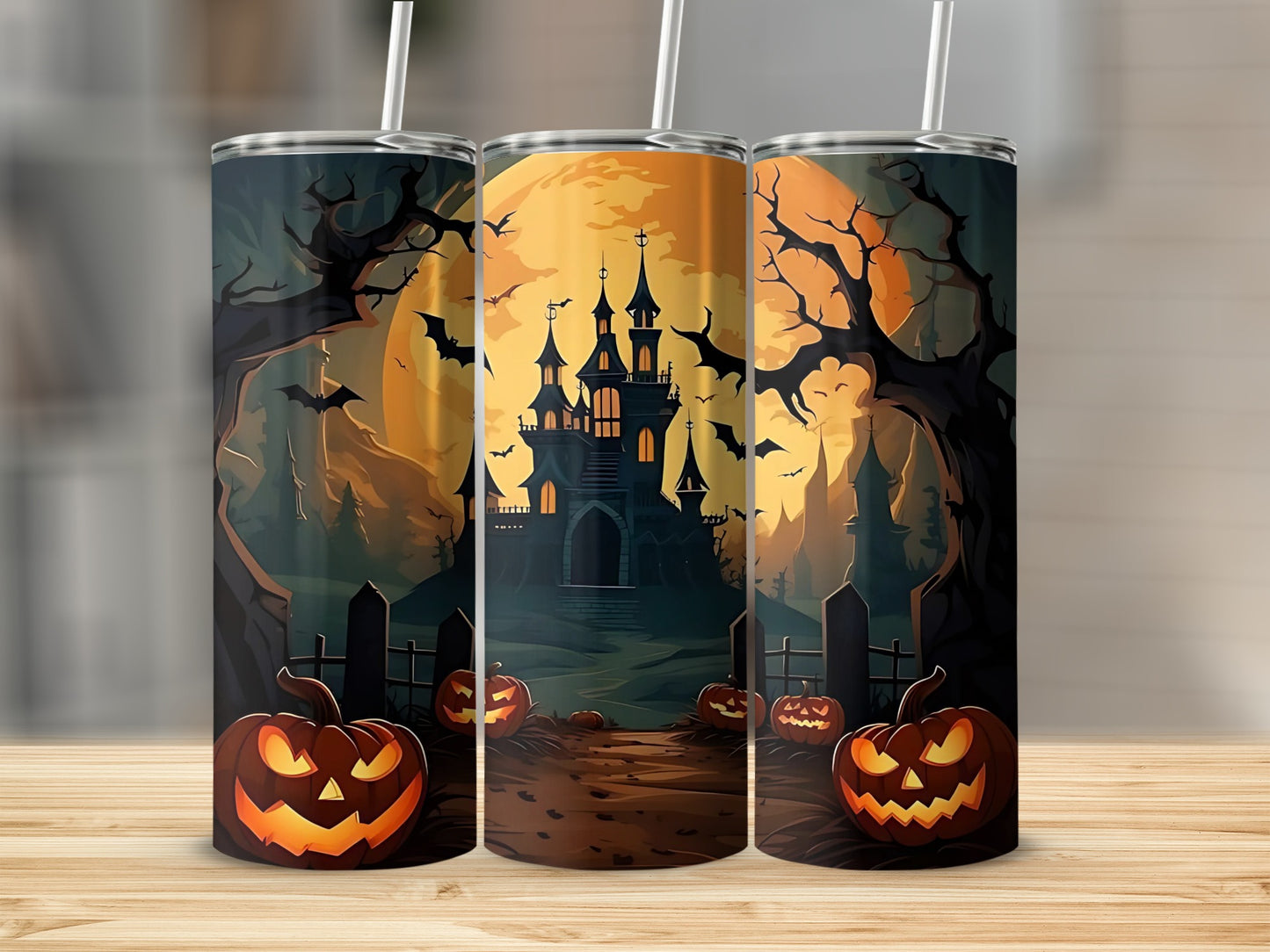 Three tumblers with a Halloween scene featuring a castle, pumpkins, bats, and a large moon.