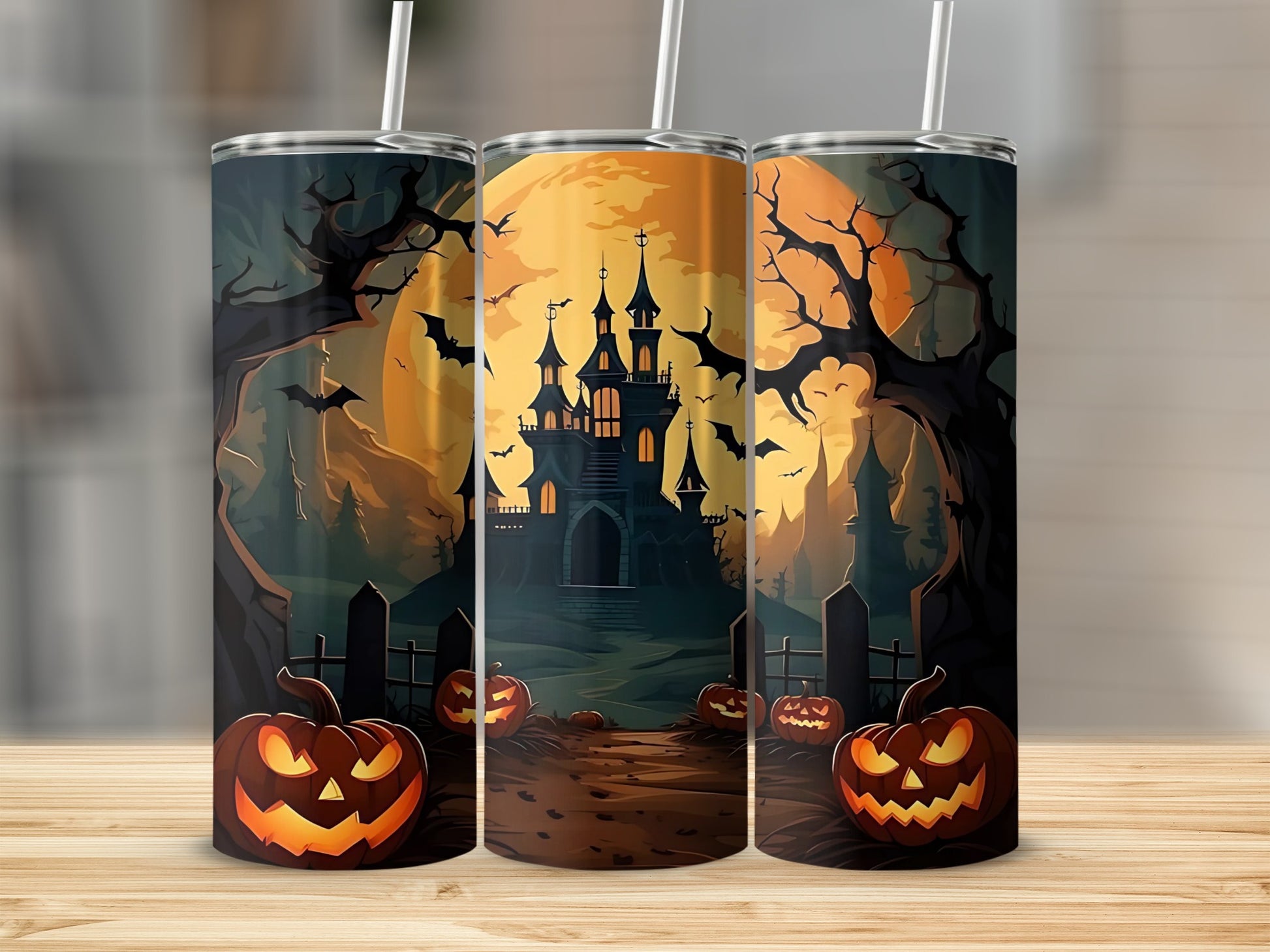Three tumblers with a Halloween scene featuring a castle, pumpkins, bats, and a large moon.