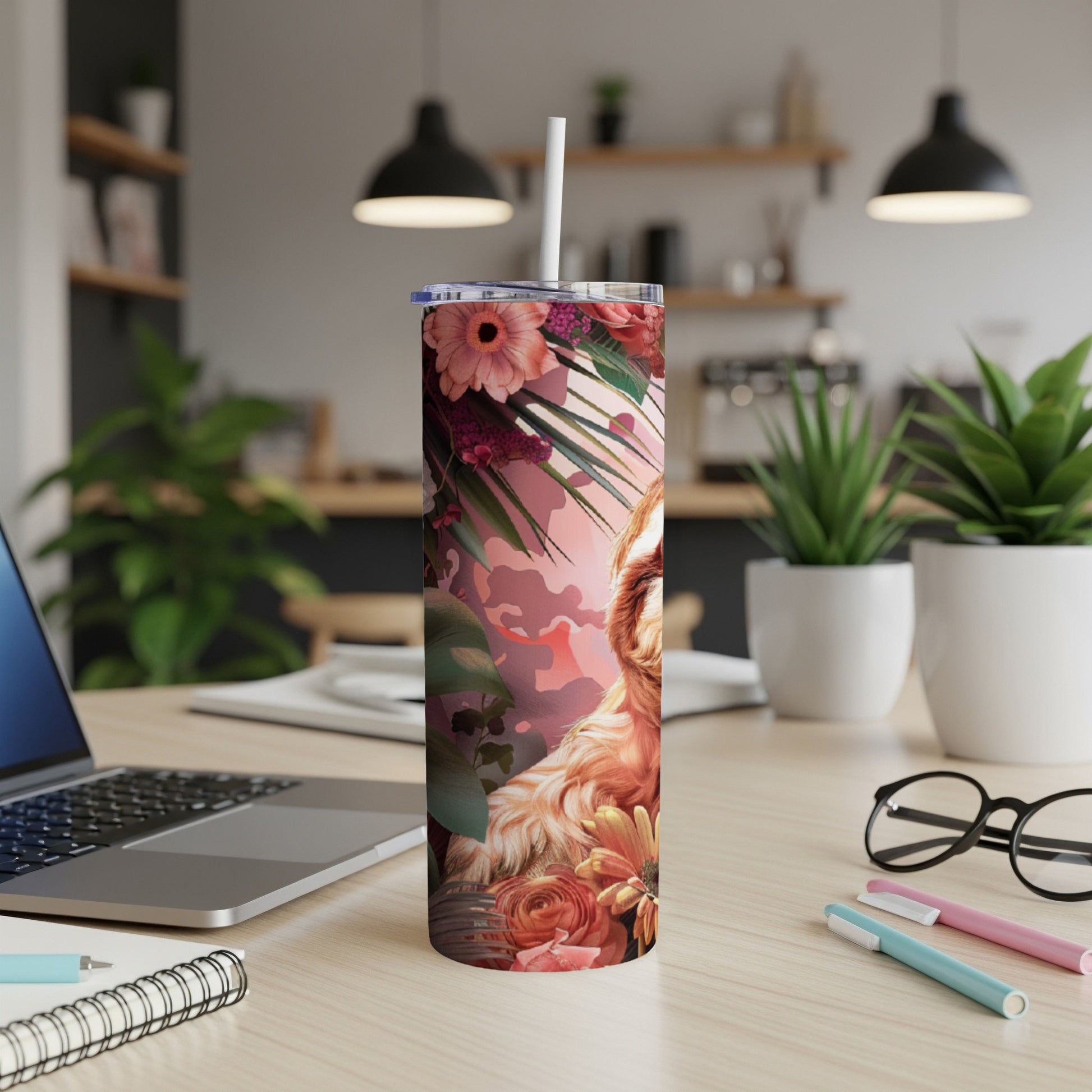 Golden retriever and floral pattern on a skinny tumbler with a straw.