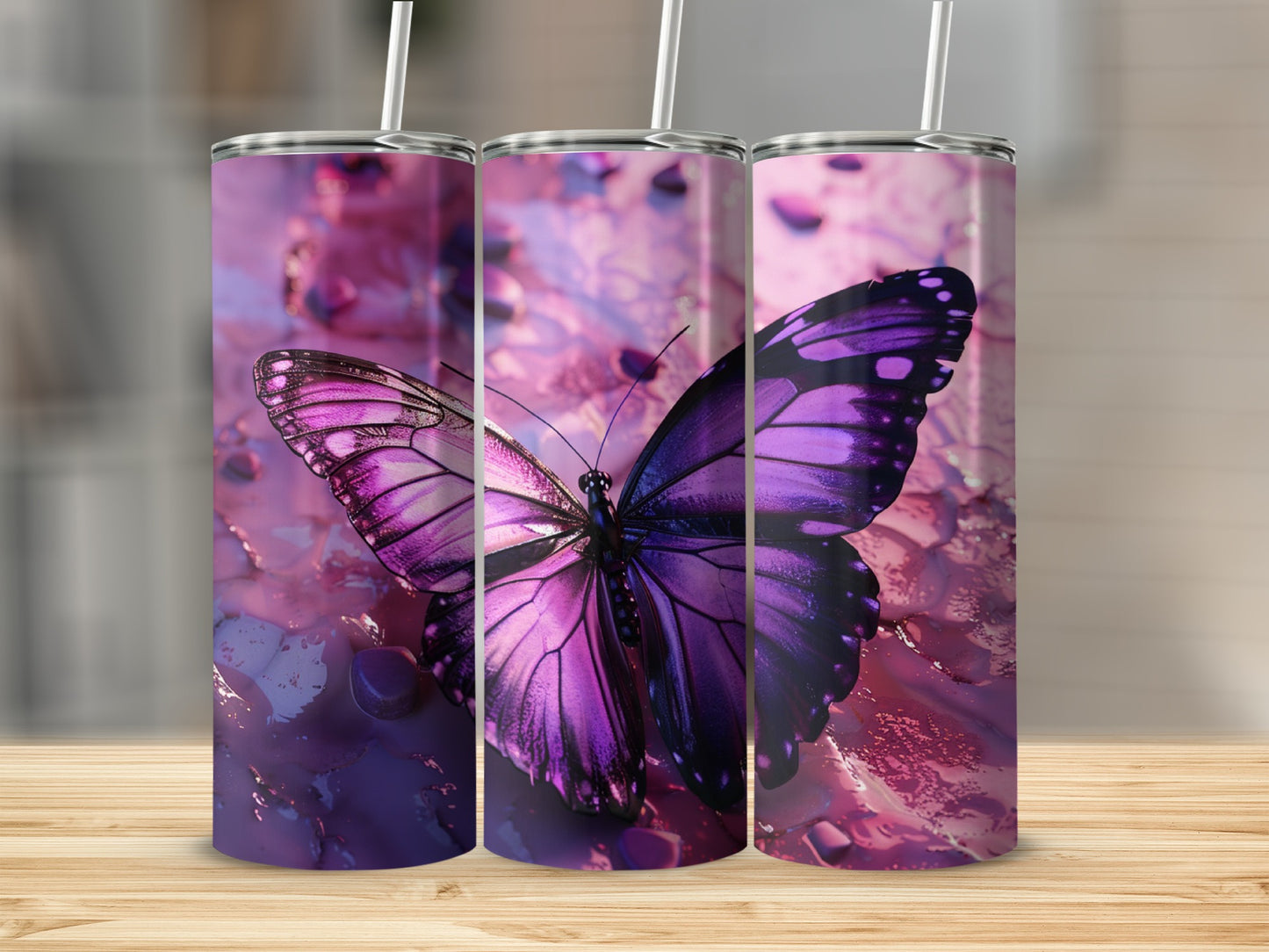 Purple butterfly on a pink, textured background, shown on three tumblers.