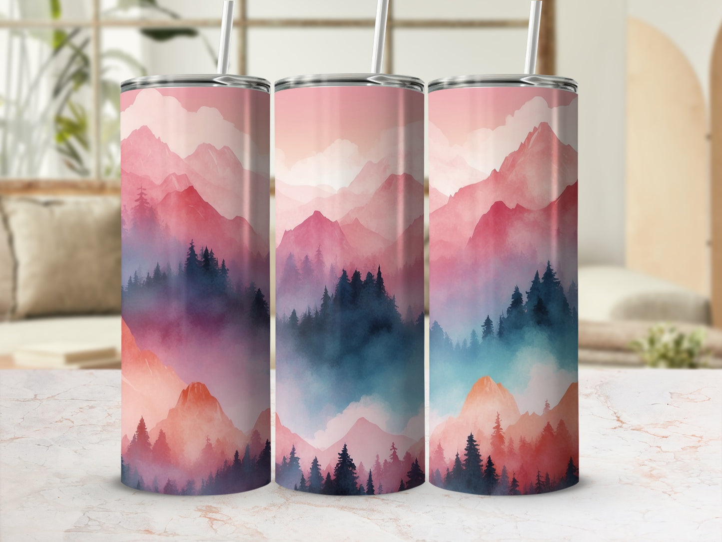 Three tumblers with a hazy pink and blue mountain landscape design.
