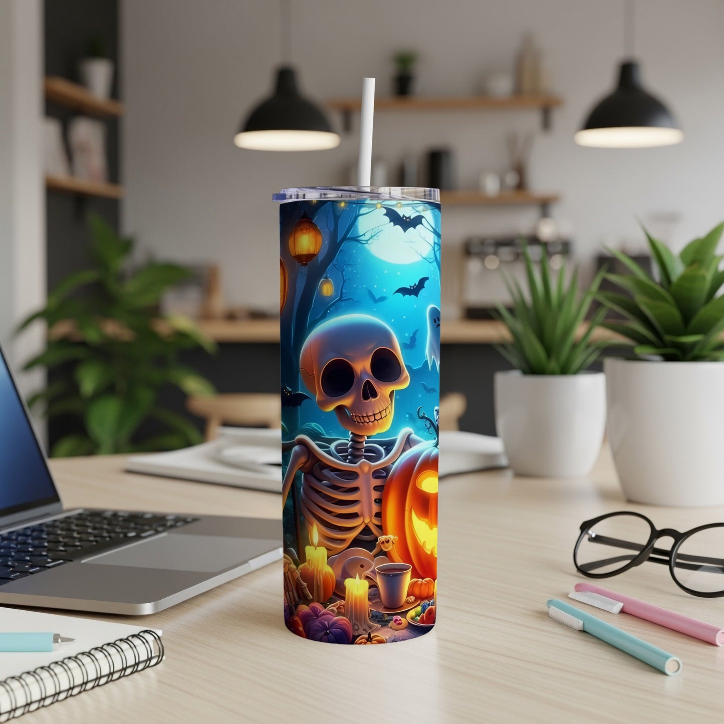Halloween tumbler with skeleton, pumpkins, bats, and ghost.