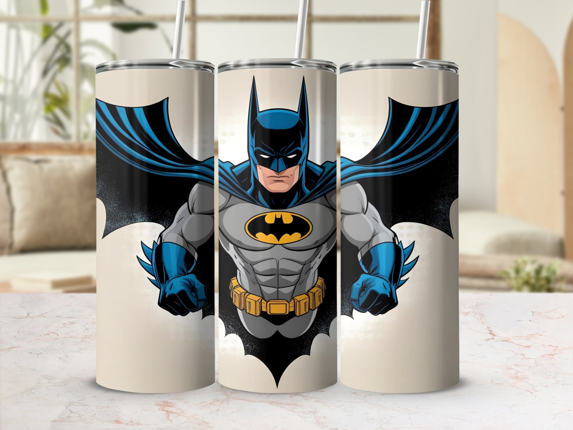 Batman illustration on a cream-colored tumbler with a straw.