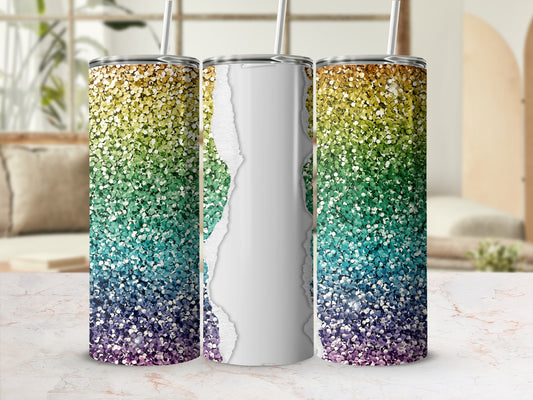 Rainbow glitter tumbler with torn paper design and straw.