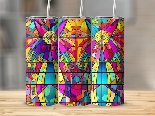 Three stained glass tumblers with vibrant abstract geometric patterns.