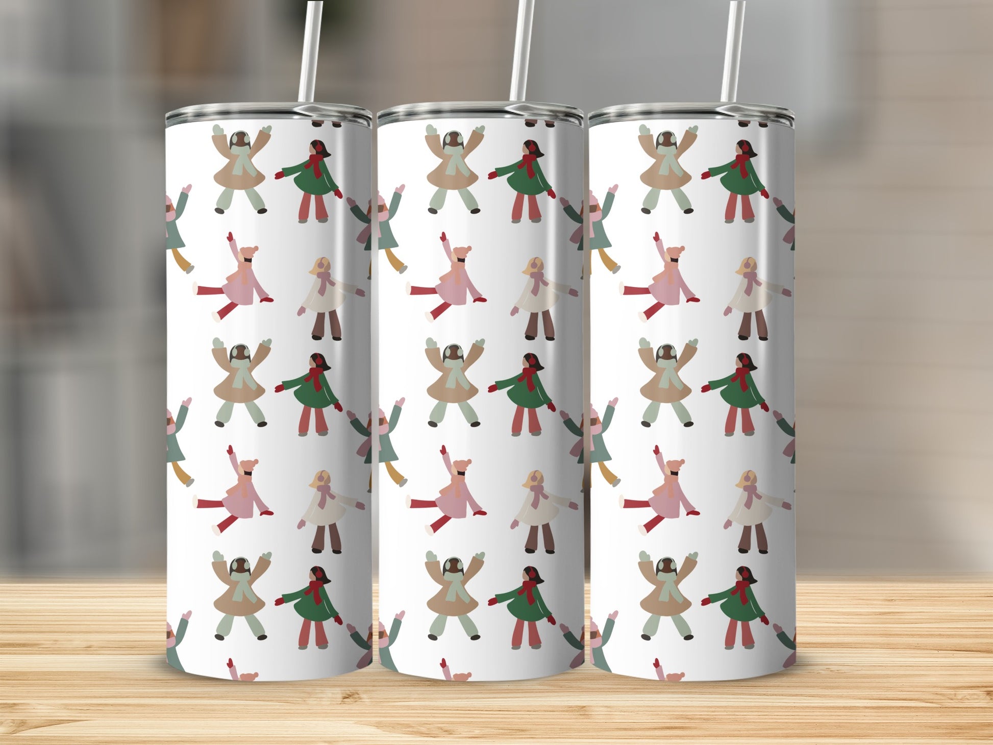 Three tumblers with a repeating pattern of people in winter coats and hats.