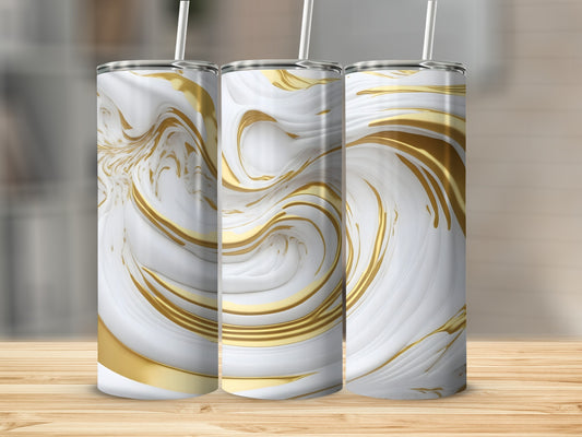 Three white and gold marbled tumblers with straws on a wooden surface.