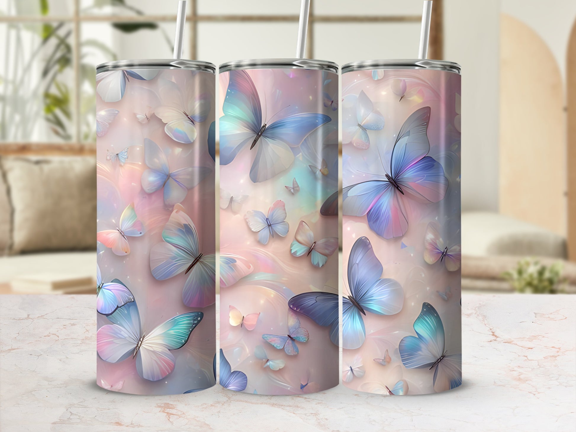 Three tumblers featuring pastel butterflies and floral accents.