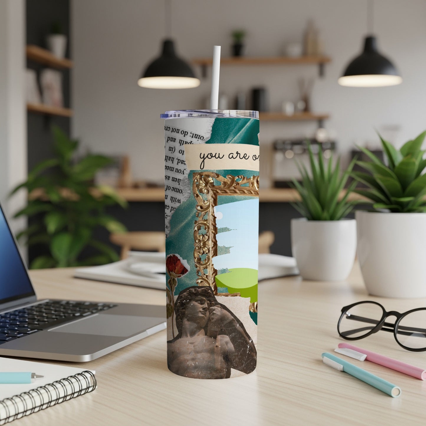 Collage tumbler with a classical sculpture, rose, and text "you are o".