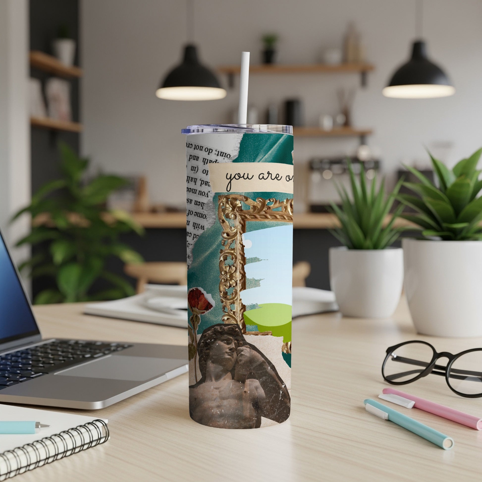 Collage tumbler with a classical sculpture, rose, and text "you are o".