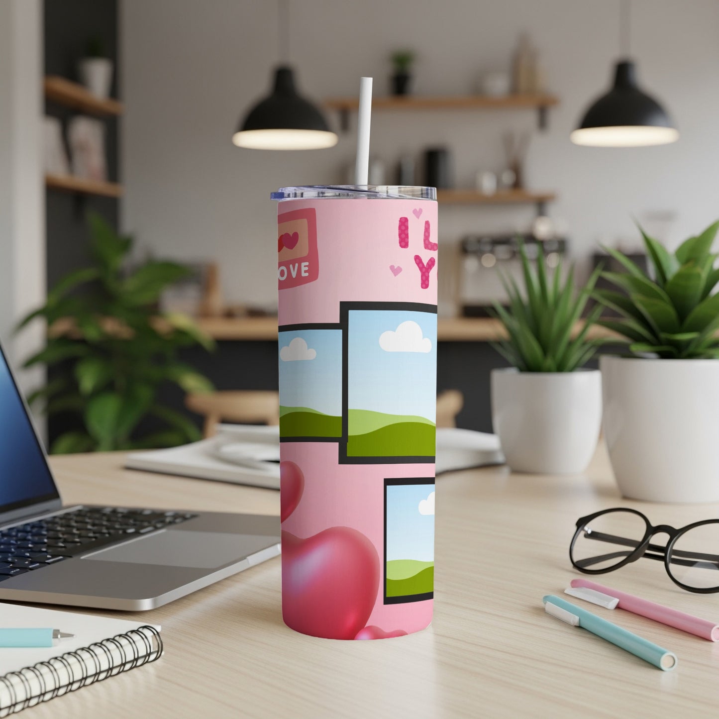 Pink tumbler with hearts and "I Love You" text, and photo frames.