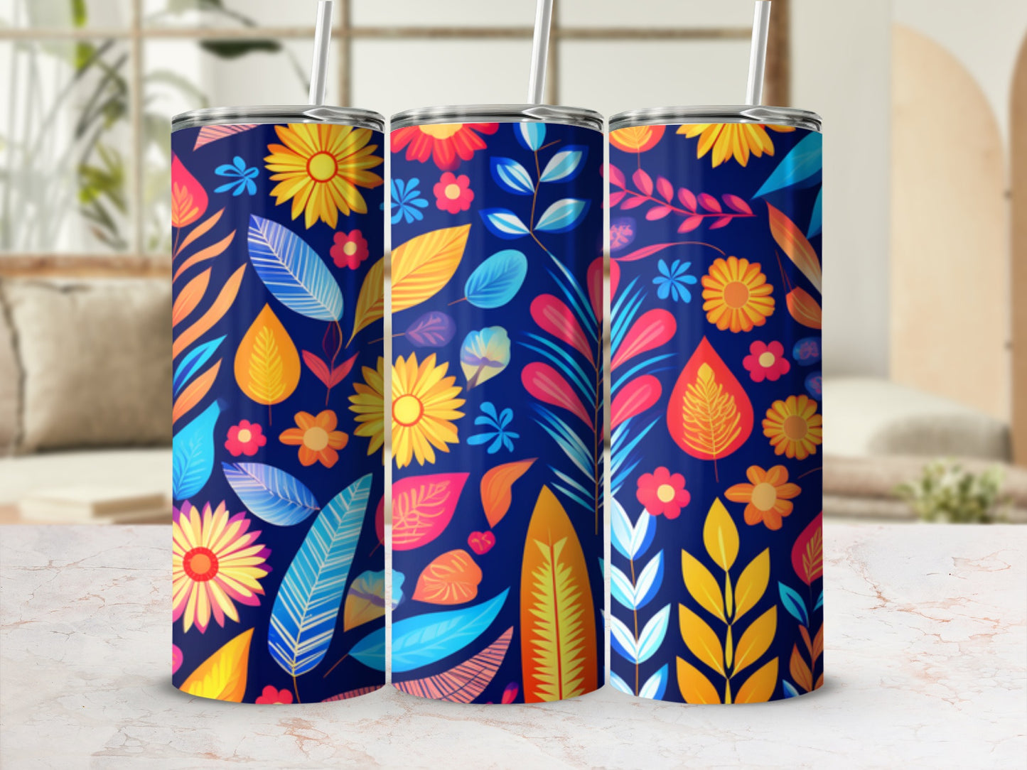 Three tumblers with a colorful floral and leaf pattern.