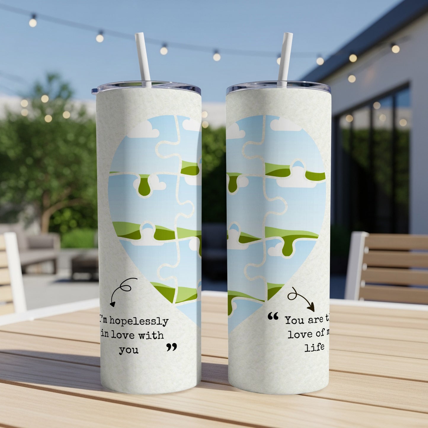 Two tumblers with heart-shaped puzzle designs and quotes about love.