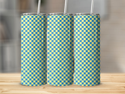 Three tall tumblers with blue and yellow checkered pattern and straws.