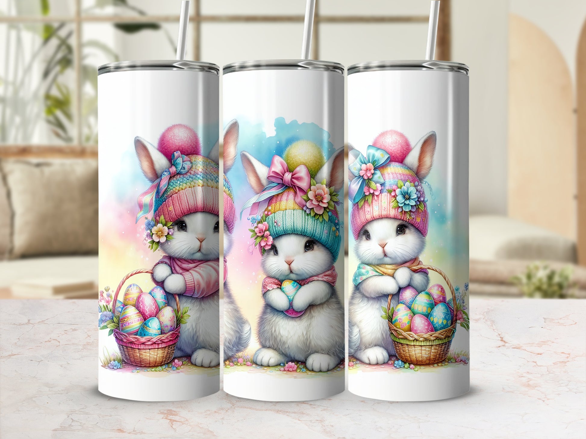 Three tumblers featuring a cute bunny holding a basket of Easter eggs.