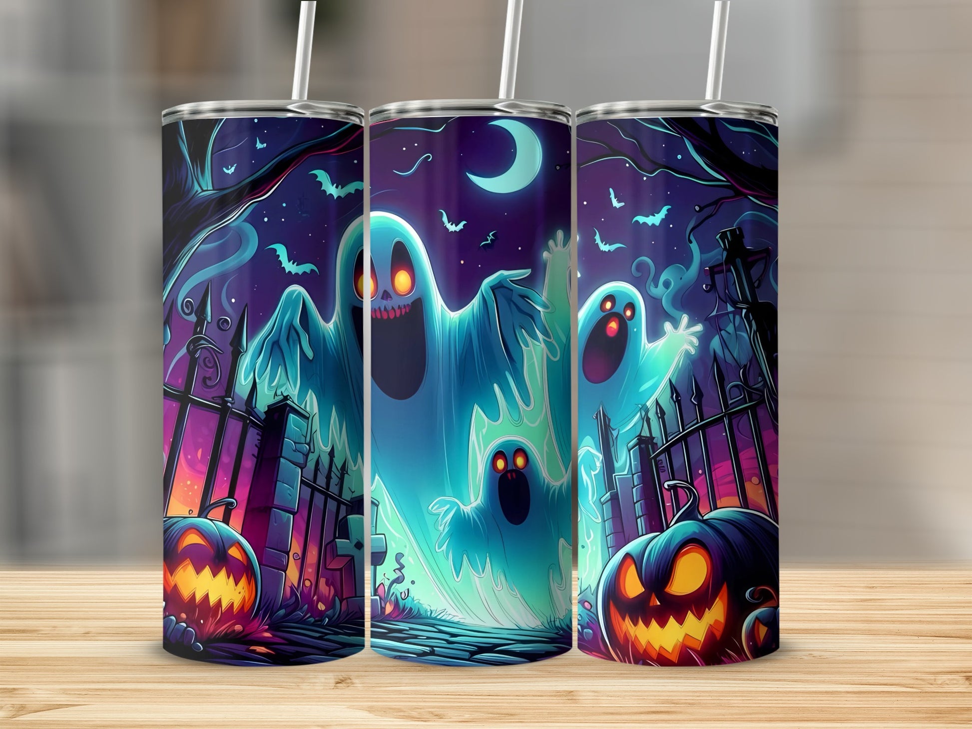 Three tumblers with a spooky Halloween scene featuring ghosts, pumpkins, and bats.