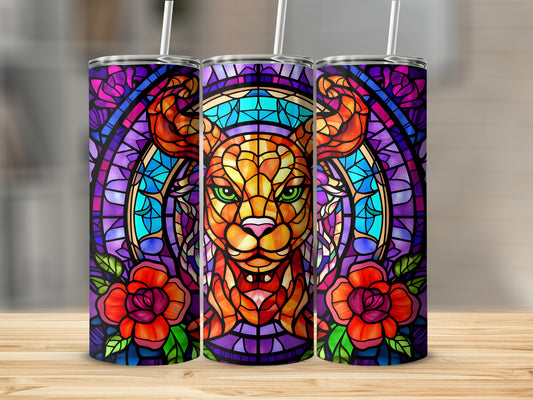 Stained glass lion with roses on a purple and blue background.