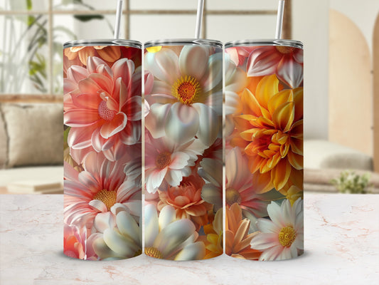 Three floral tumblers with straws, showcasing pink, white, and orange chrysanthemum designs.