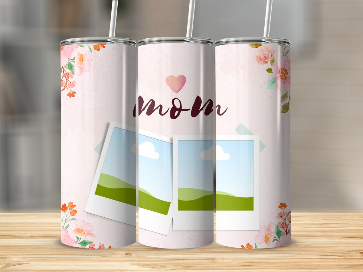 Three tumblers with pink watercolor floral design and "Mom" text.