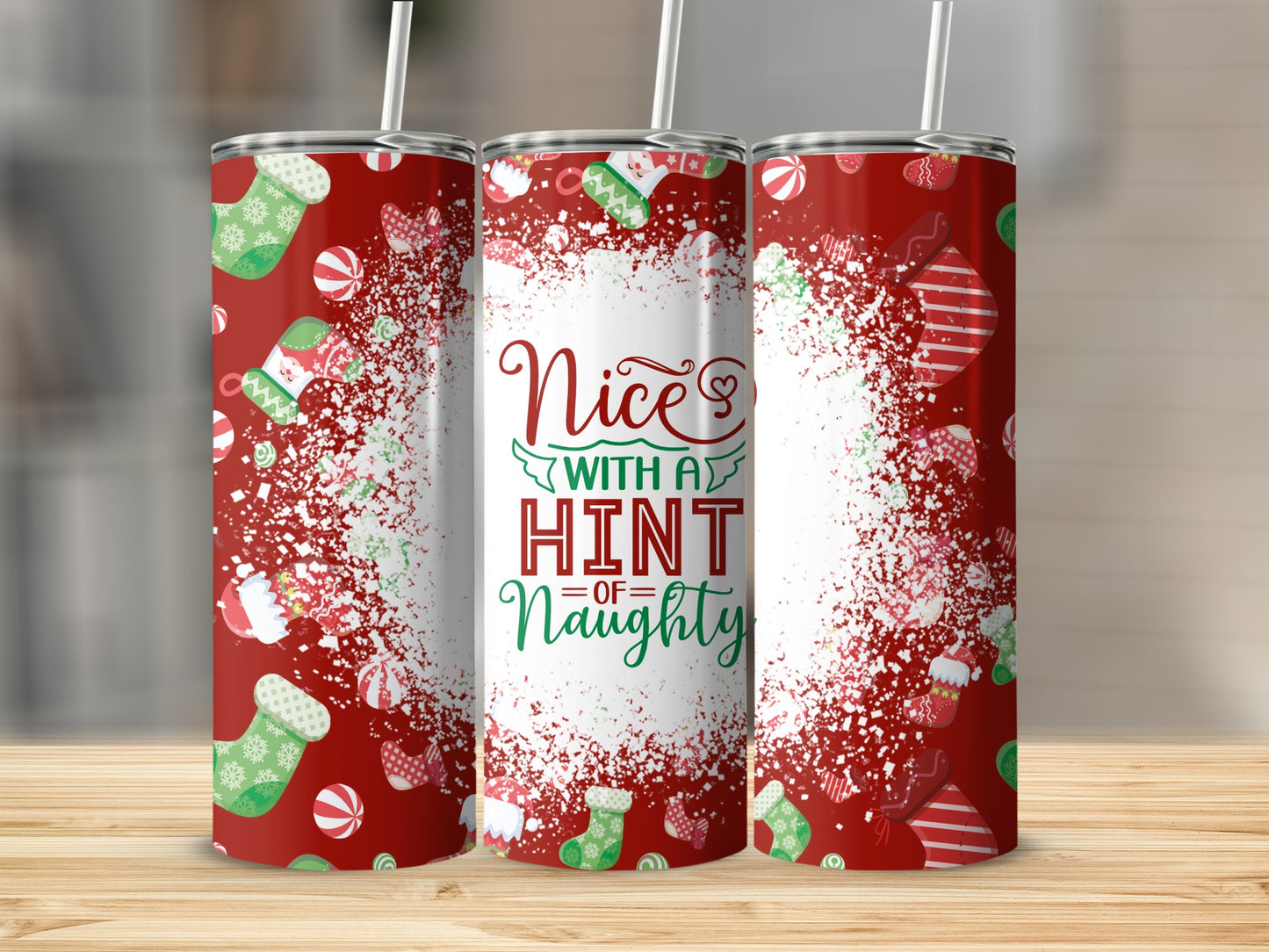 Red tumbler with Christmas stocking pattern and "Nice with a hint of Naughty" text.