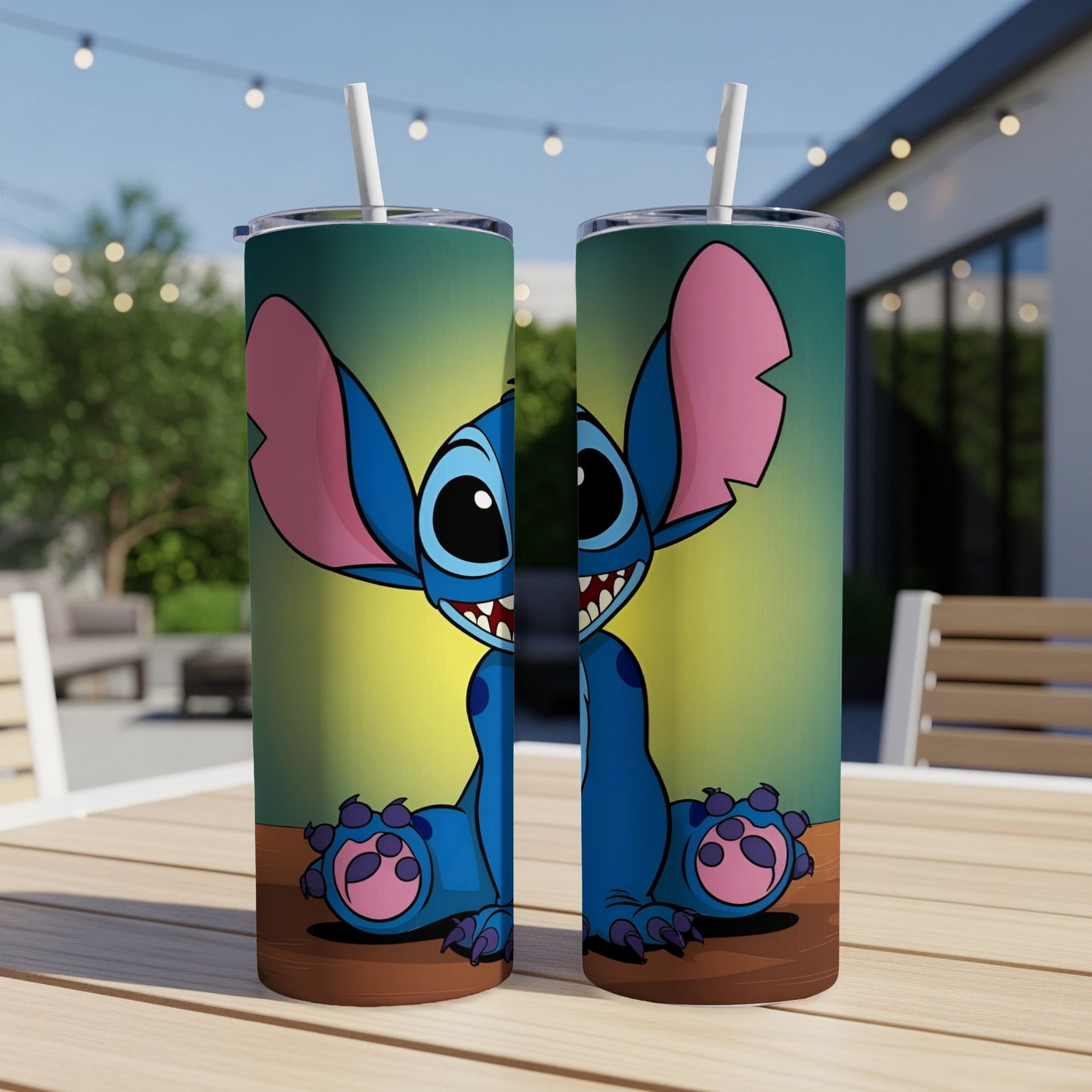 Stitch character on a tumbler with straw on a table.