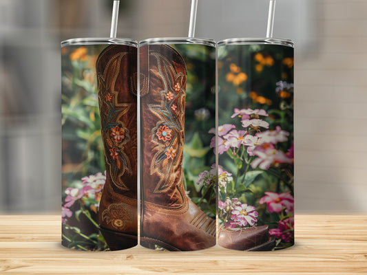Brown cowboy boot with colorful floral embroidery on a wooden surface.