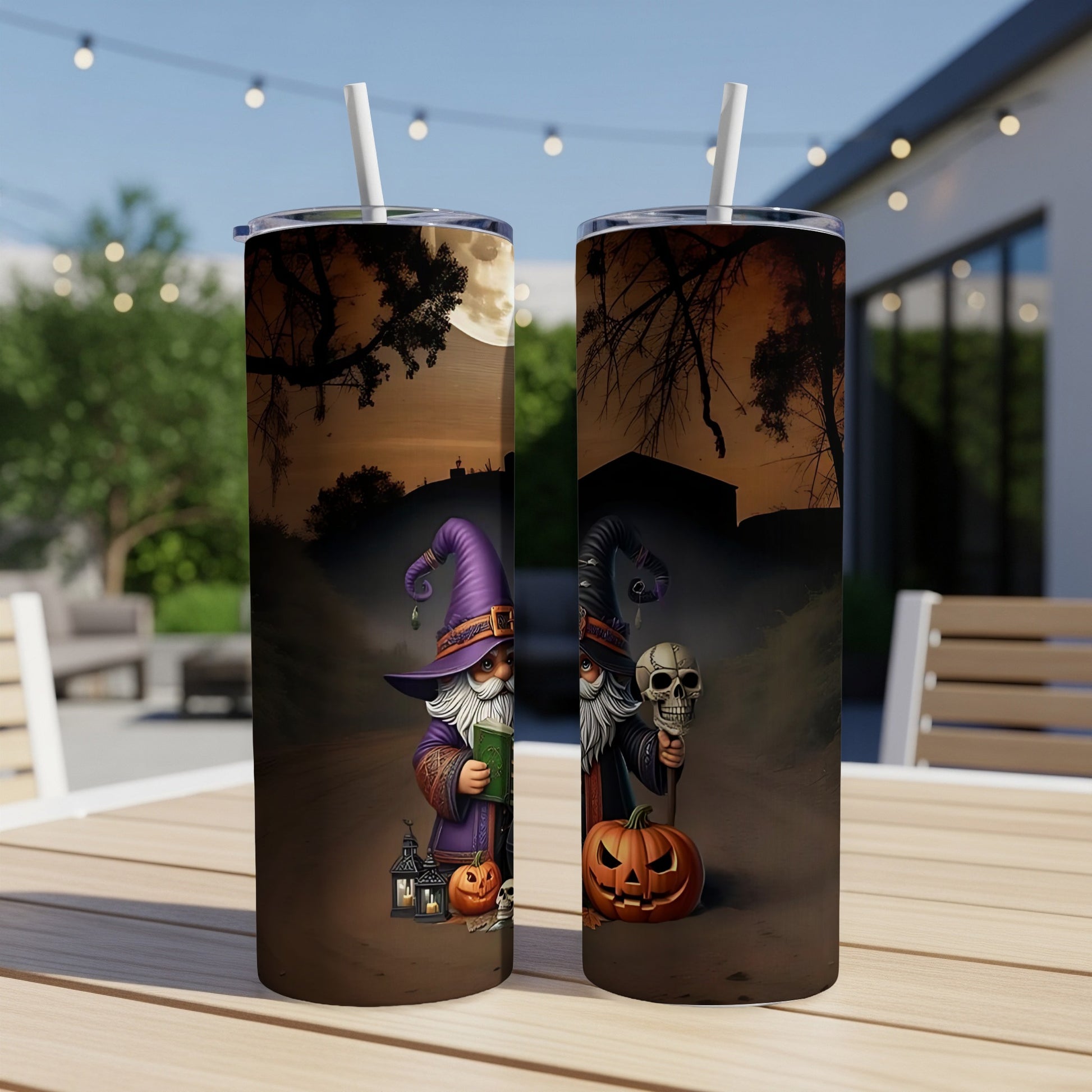 Two tumblers with Halloween designs featuring wizards, pumpkins, and skulls.