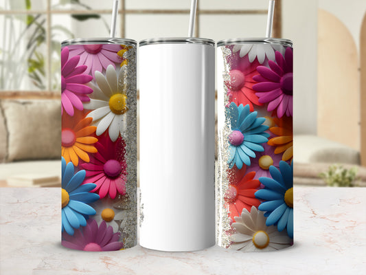 White tumbler with colorful daisy floral pattern and glitter accents.