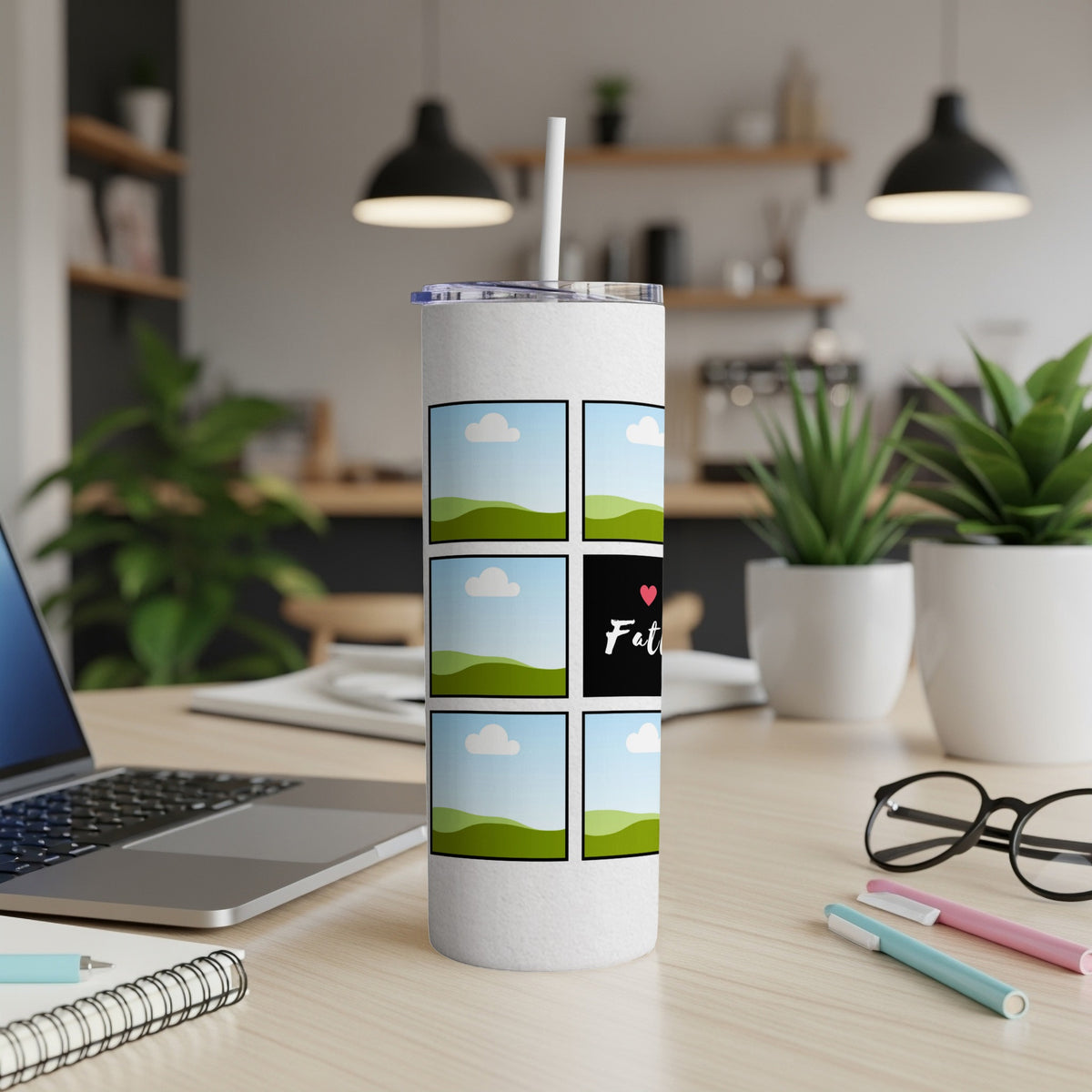 White tumbler with comic strip design featuring landscape images and "Fat" text.