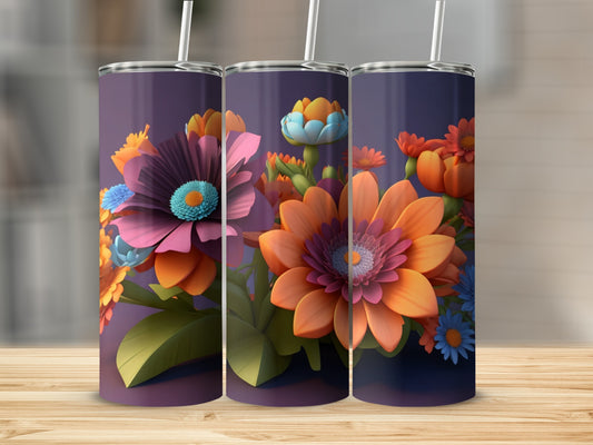 Three tumblers with colorful floral designs on a wooden surface.