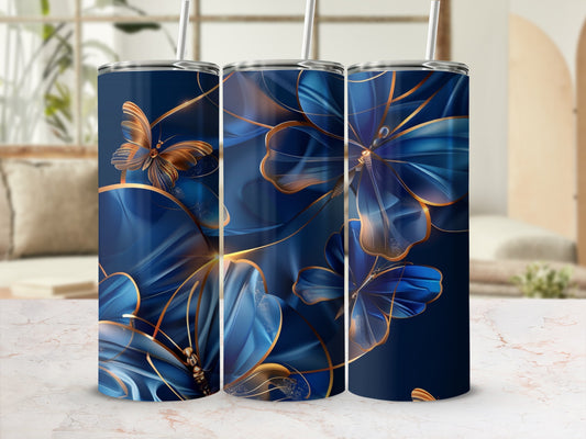Dark blue tumbler with gold butterfly and floral design.