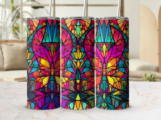 Three stained glass tumblers with colorful floral patterns.
