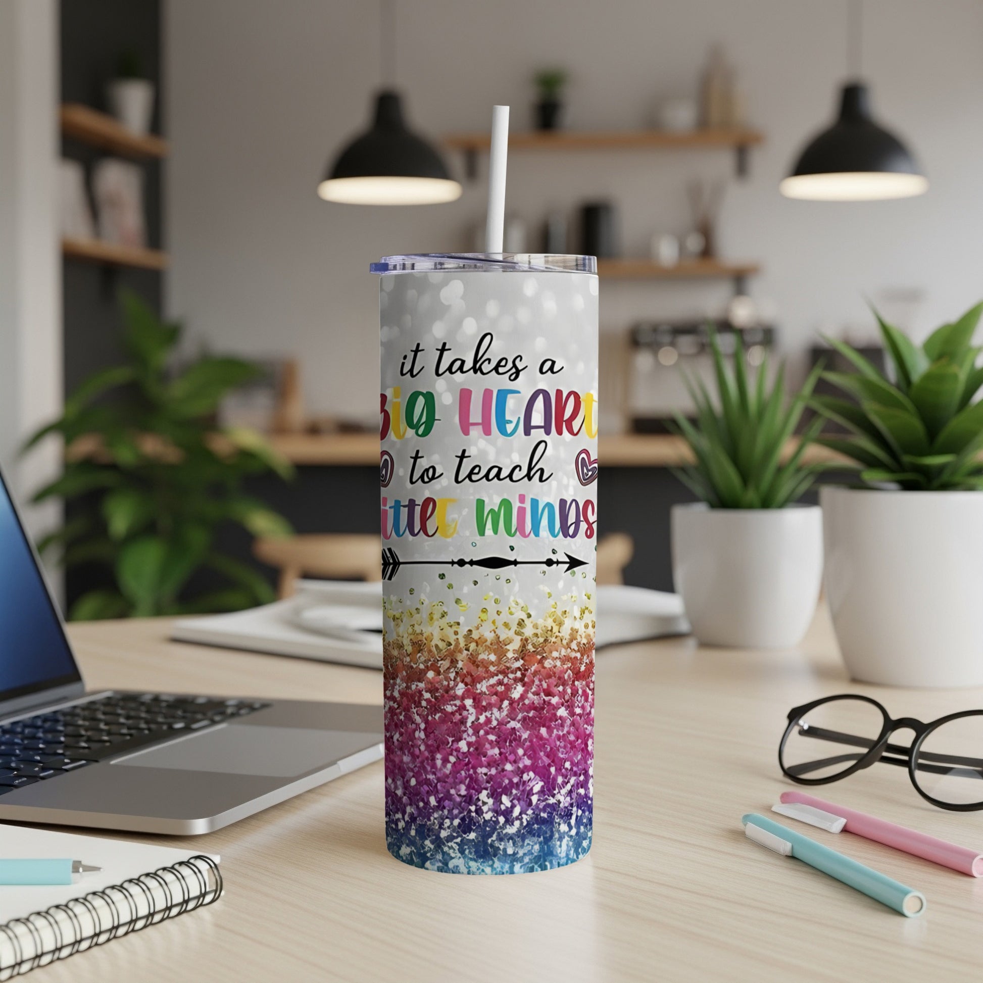 Glittery tumbler with "It takes a big heart to teach little minds" text.