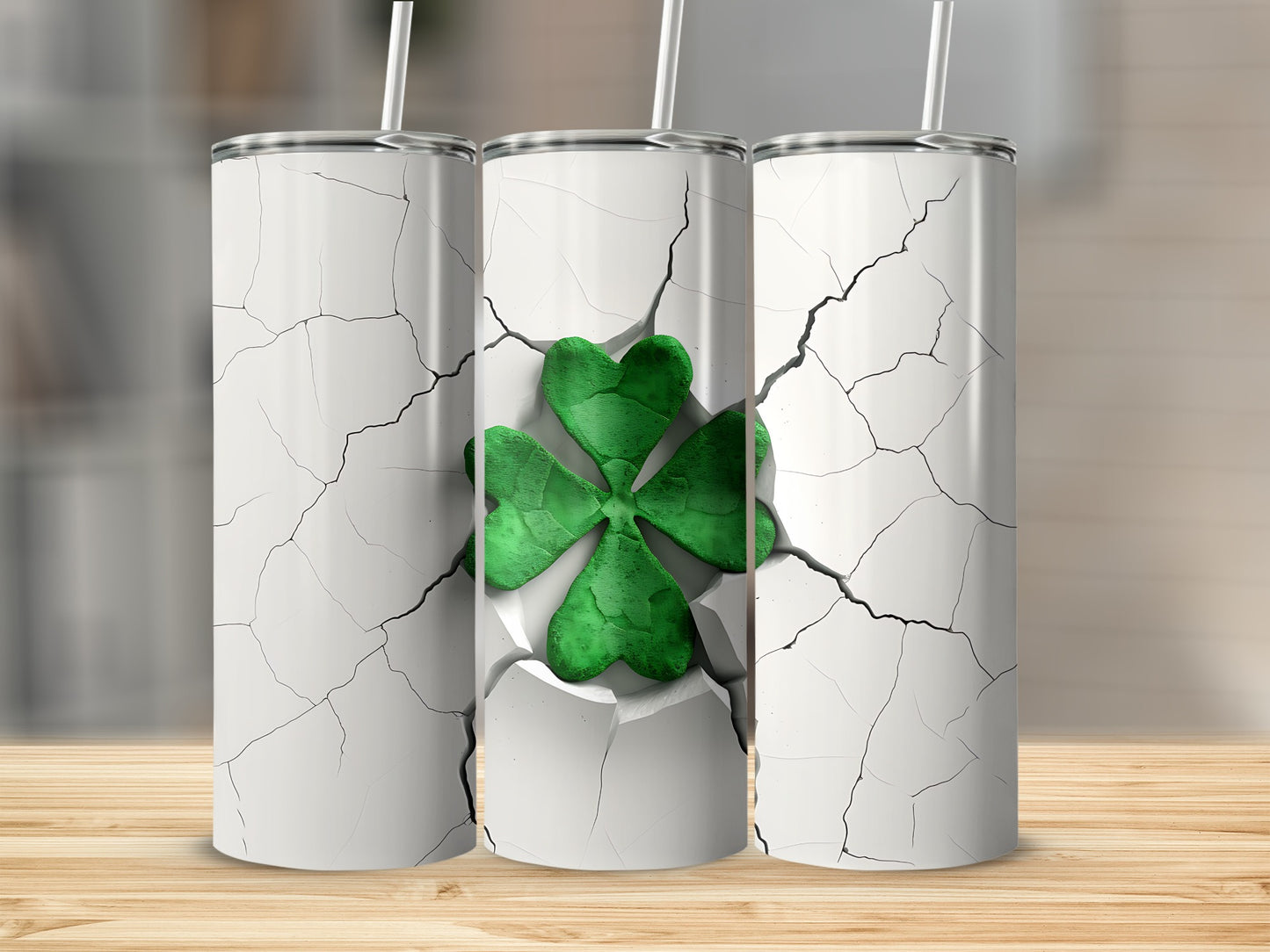 Three white tumblers with cracked texture revealing green shamrocks.