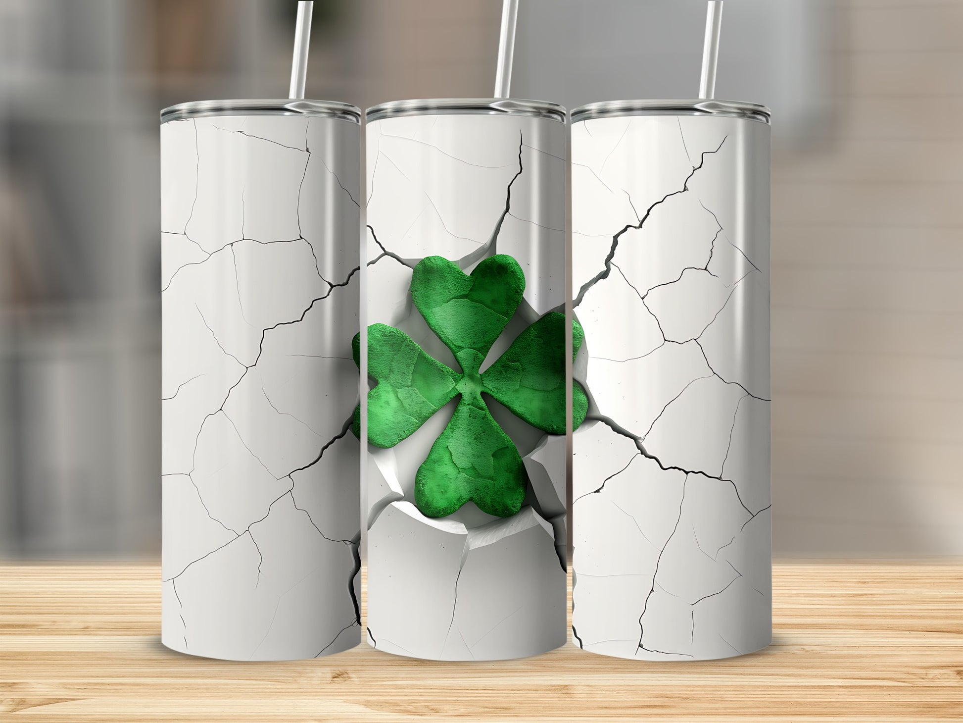 Three white tumblers with cracked texture revealing green shamrocks.
