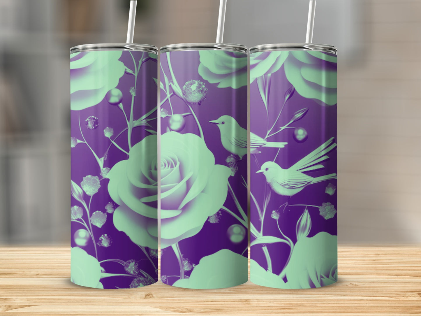 Purple tumbler with mint green floral and bird design.