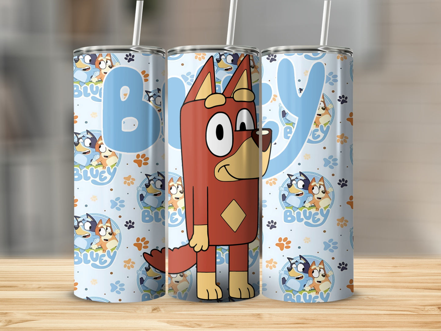 Bluey character tumbler with character pattern and blue "Bluey" text.