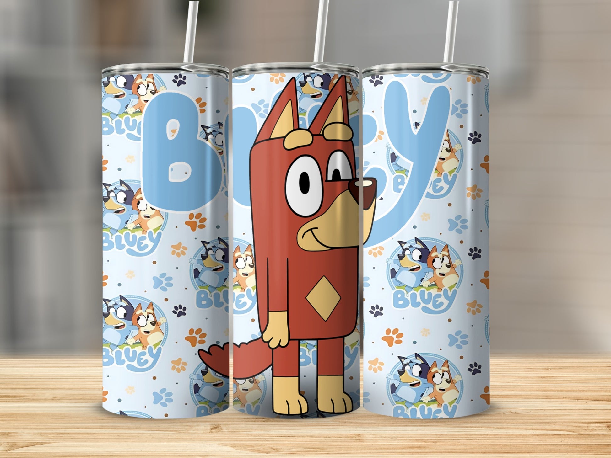 Bluey character tumbler with character pattern and blue "Bluey" text.