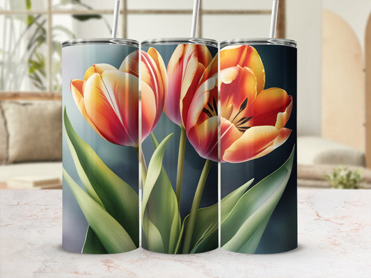 Three tumblers featuring stylized red and yellow tulips with green leaves.
