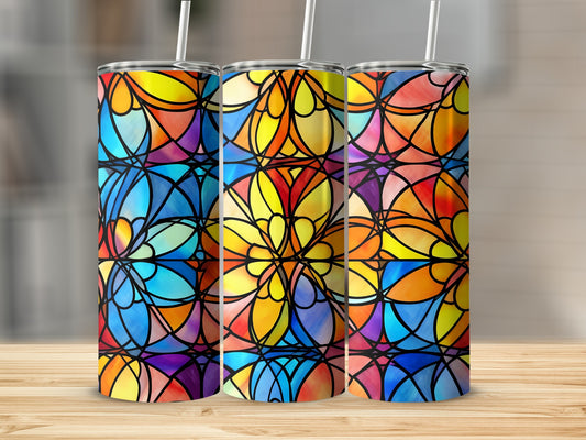 Three tumblers with stained glass-inspired colorful abstract pattern.