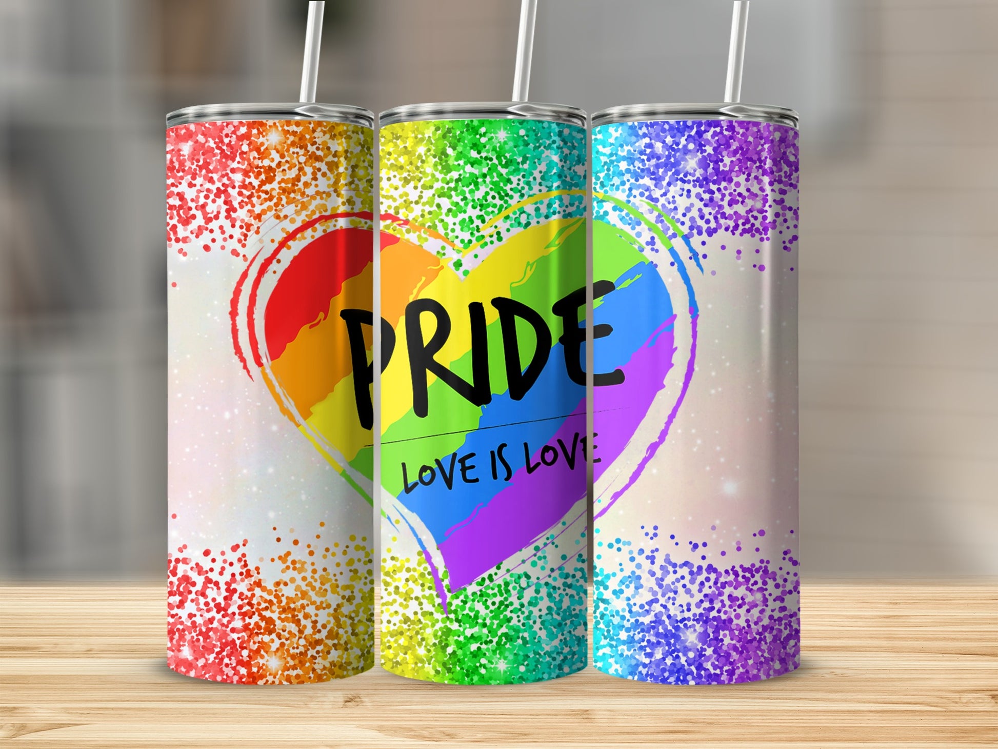 Rainbow heart tumbler with "Pride Love is Love" text.