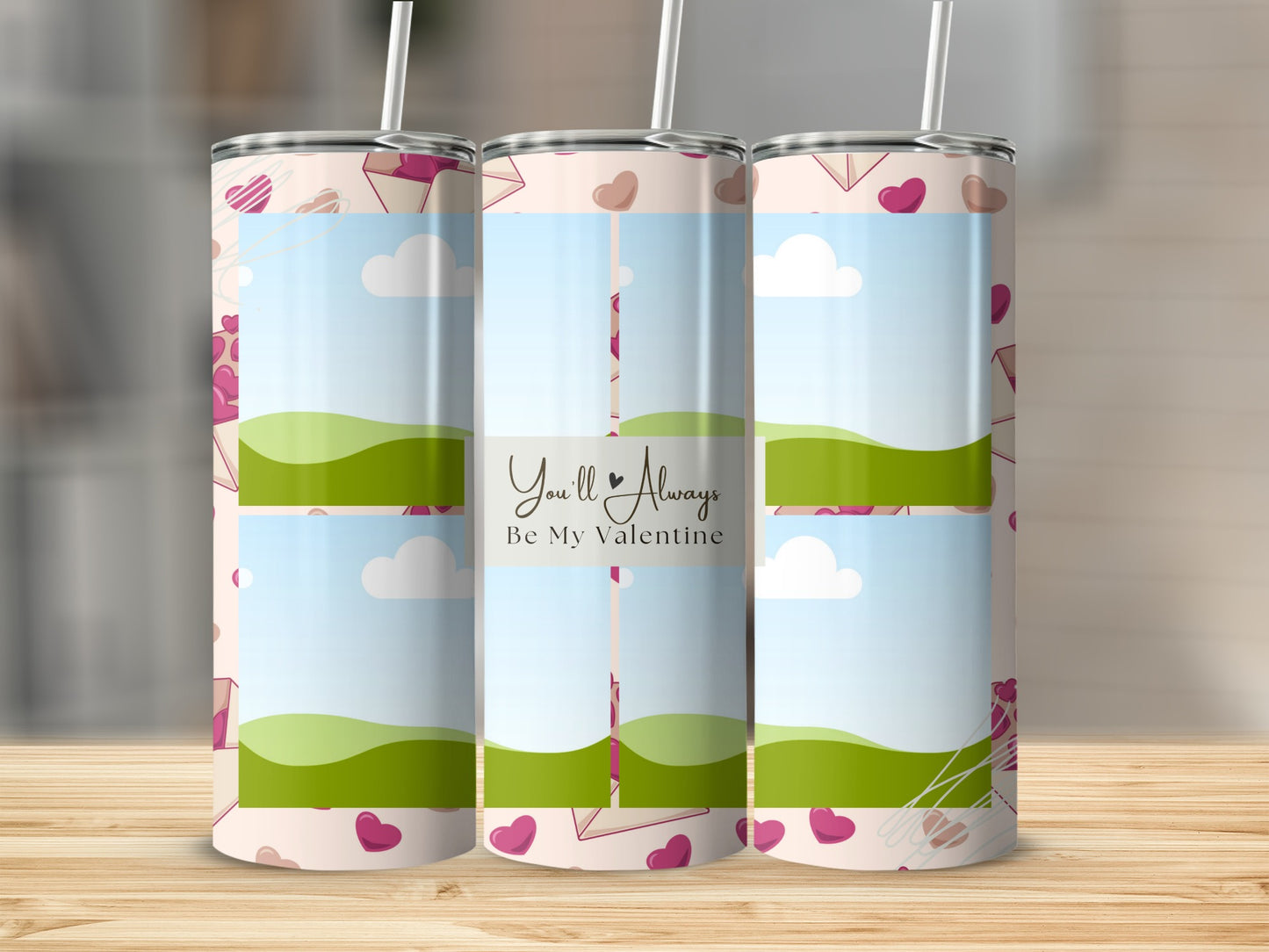Three tumblers with a Valentine's Day design featuring hearts and envelopes.